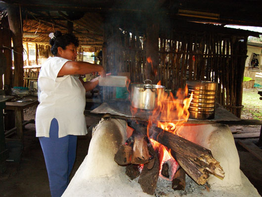 Angelica in the Caracol camp kitchen