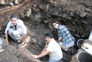 Rachael, Angelica, and Carlos excavating in front of the Ultimo stairs