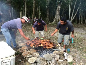 Rob, Nelson, and Carlos bargequing the chicken